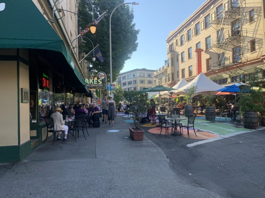 Downtown Portland street scene with outdoor diners